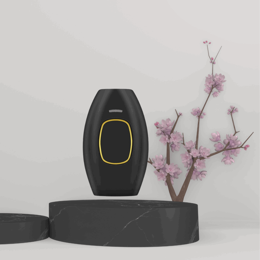 Black electronic IPL hair care device with yellow accent on a black platform against a light gray background with pink flowers.