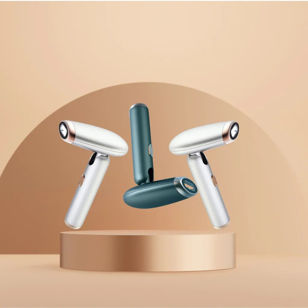 Three handheld IPL hair removal device on a beige platform with a beige background