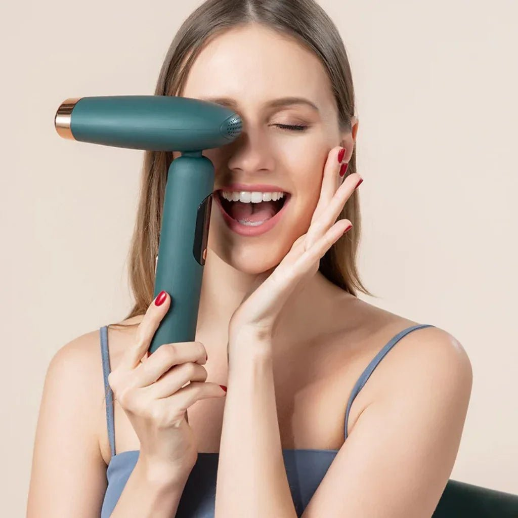 Woman using an IPL hair removal device on her face against a beige background
