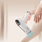IPL hair removal device being used on a leg with a soft background
