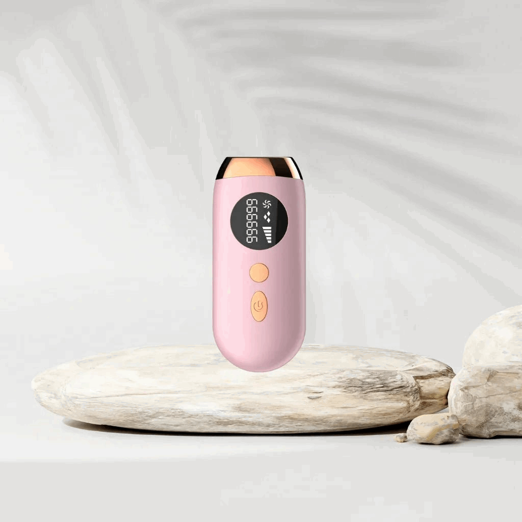 Pink IPL hair removal device with digital display on a light gray background